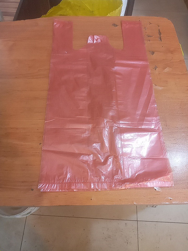 نایلکس نایلون رنگی(قرمز) دسته دار  مواد نو سایز ۴۵×۵۵(بسته ۱۰ کیلویی)