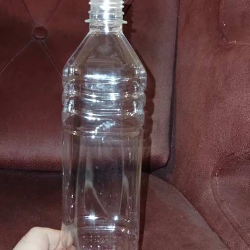 بطری پت ۹۰۰  سی سی چهارگوش با درب (بسته ۱۵۰ تایی)